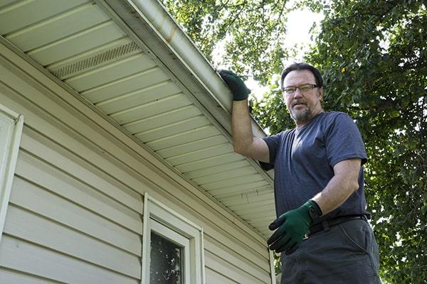 Gutter Cleaning of Dania Beach workers